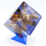 Cubo de resina con puros encapsulados