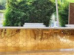 Supra-reciclaje Bar con diseño de hexágonos dorados